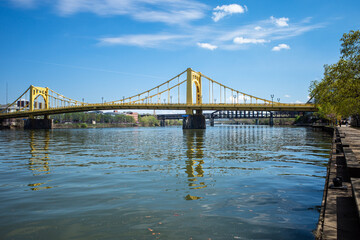 Fototapeta na wymiar Rachel Carson bridge crossing Allegheny River in Pittsburgh, Pennsylvania, with raildroad bridge in the background.