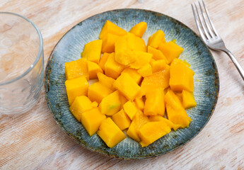 Nice refreshing diced mangoes served on plate with style