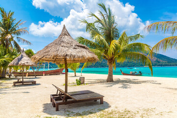 Parasol, sunbed on beach