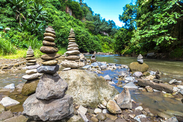 Balanced stones by the river