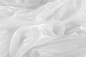 Fototapeta premium White tulle fabric as background, closeup view