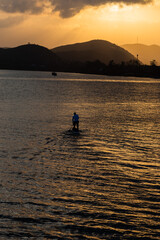 Boating on the river at sunset