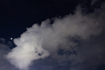 clouds and stars in the sky