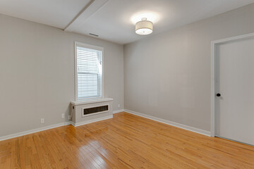 Clean Minimal Modern Apartment Bedroom Interior with Sustainable Wood Floors