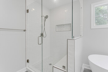 Clean New Modern White Glass Shower in Primary Bathroom 
