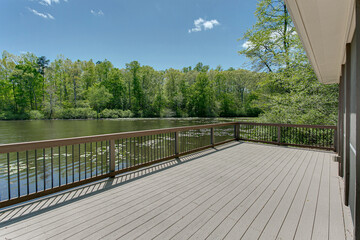 Spring Day on Deck Overlooking Beautiful Lake with Lily Pads