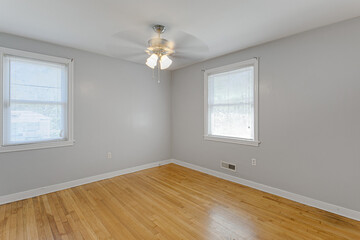 Clean Empty Minimal Modern Apartment Bedroom Interior with Hardwood Floors