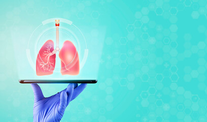 Lung problems, tuberculosis, lung cancer. The doctor's hand holds a tablet that shows the lungs....