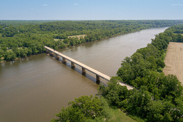 Aerial Birds Eye View of Bridge Over River in Nature During Summer