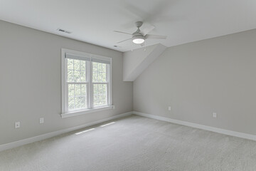 Clean Modern Empty Apartment Bedroom Interior with Blank Walls and Grey Accent Color