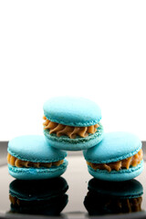 Closeup pan of lavender purple macarons stacked on slate board. High quality FullHD footage