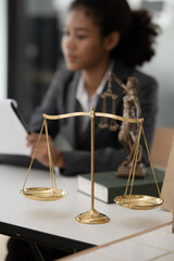 Asian woman lawyer businesswoman Working to view legal documents at the office