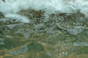 Running water bubbles.