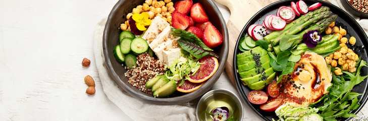 Healthy vegetarian and vegan  salads and Buddha Bowls with vitamins, antioxidants, protein on light  background.