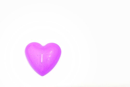 Pink heart on a white background, love, romance, hearts, photo background