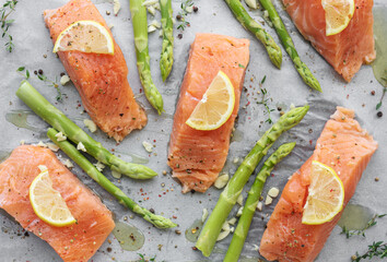Fresh delicious salmon, green asparagus and lemon
