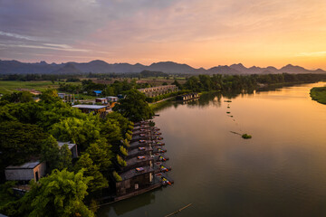 Fototapeta premium Aerial view of River Kwai and floating houses in Kanchanaburi province, Thailand