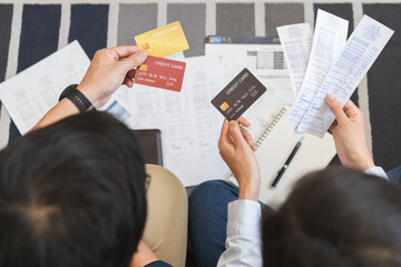 Stressed financial owe asian young couple love sitting stressed and confused hand calculate expense...
