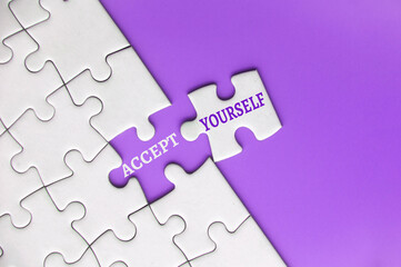 Accept yourself text on missing jigsaw puzzle. Motivational concept