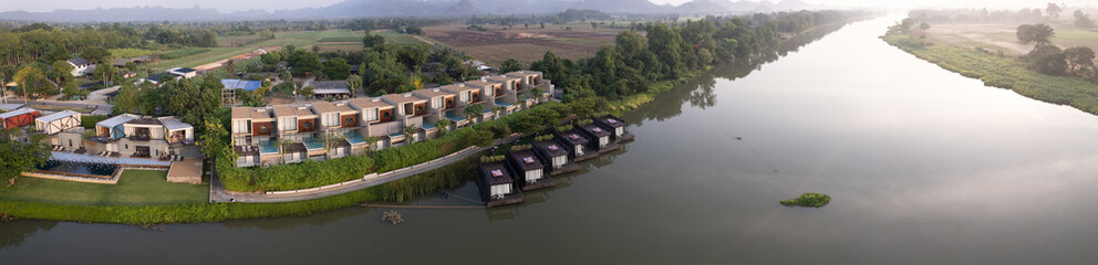Fototapeta na wymiar Aerial view of River Kwai and floating houses in Kanchanaburi province, Thailand