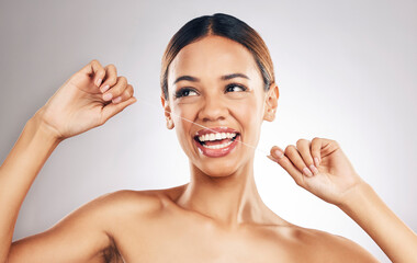 Smile, dental floss and woman in studio for mouth, teeth and wellness, hygiene or fresh breath on...