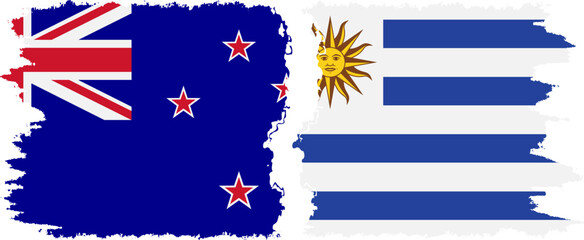 Uruguay and New Zealand grunge flags connection vector