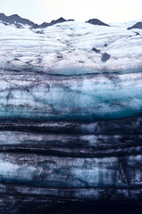 Geological Tapestry: Katla's Ashes Layered in Mýrdalsjökull Glacier