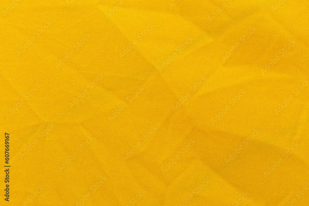 Canvas Prints Yellow color sports clothing fabric football shirt jersey texture and textile background.