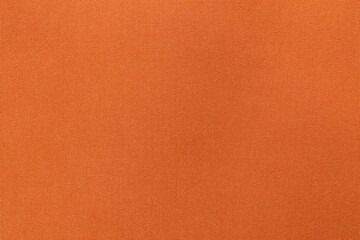 Orange color fabric cloth polyester texture and textile background.