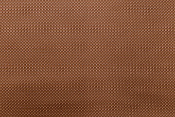 Brown leather and a textured background.