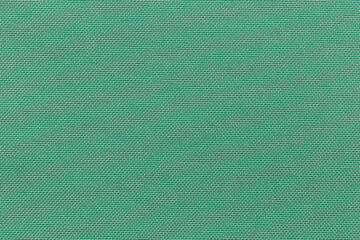 Fototapeta premium Green color fabric cloth polyester texture and textile background.