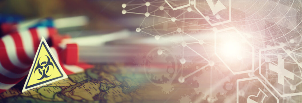 American flag, test tubes and biohazard sign. The concept of American biolabs and research centers.