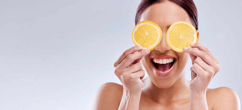 Skincare, mockup or happy woman with orange as natural facial with citrus or vitamin c for wellness. Studio background, smile or healthy girl model smiling with organic fruits for dermatology beauty