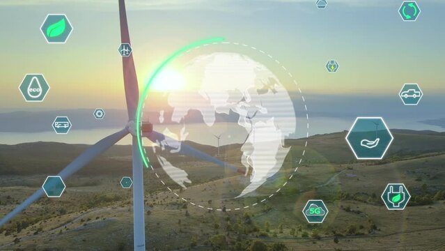 Aerial close up of wind turbine at sunset with planet earth globe animation and Sustainable development green technologies icons
