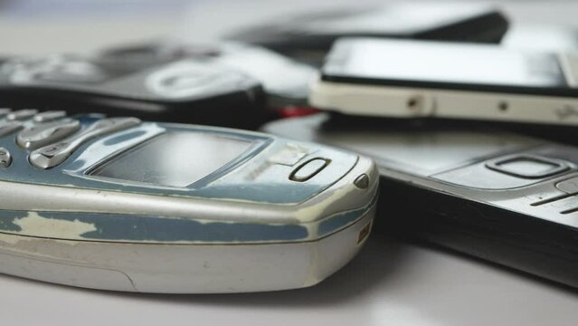 Different Types of Used Cell Phones. Old Mobile Phones Can Be a Source of Plastic and Metal for Environmental Pollution.