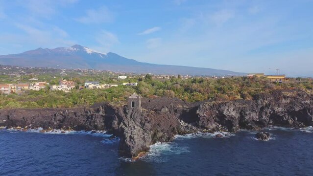 Torre Saracena old tower, Santa Tecla, Catania, Sicily. Sea and rocks