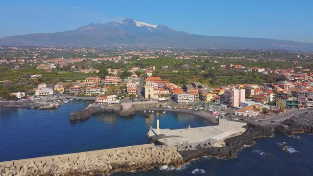 View of Stazzo old city, Catania, Sicily, Italy. Summer beach and sea
