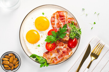 Fried Eggs and Bacon with Cherry Tomatoes on Plate, Breakfast, Keto, Paleo Diet Lunch