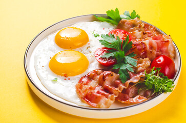 Fried Eggs and Bacon with Cherry Tomatoes on Plate, Breakfast, Keto, Paleo Diet Lunch