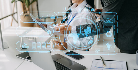 Business working with reduce CO2 concept with icons, global warming such as reforest green factory recycle and zero carbon dioxide emission concept. with VR icon at office.