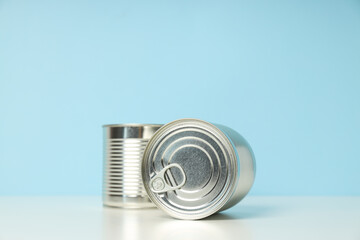Canned food in blank metal jars, concept of canned food