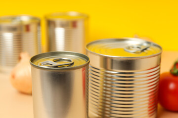 Canned food in blank metal jars, concept of canned food
