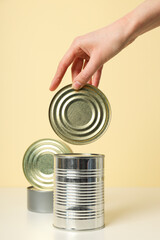 Canned food in blank metal jars, concept of canned food