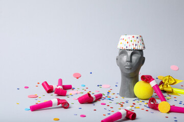 Happy birthday concept with ancient head on white background