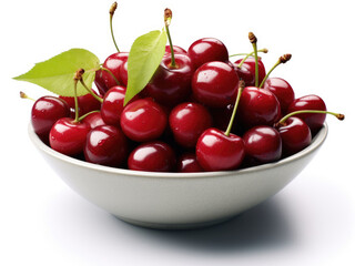 Bowl with cherries and green leaves on a white background