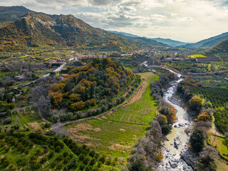 Scenic Alcantara River Park Landscape - A captivating view of Alcantara River, lush vegetation,...
