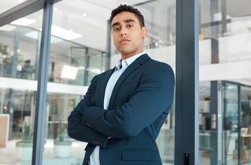 Fototapeta premium Business man, leader portrait and arms crossed with startup and company ceo in a office. Vision, professional and expert with boss confidence and corporate focus ready for working as a executive