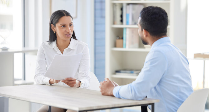 Interview, CV and business man and woman in discussion for hiring, job vacancy and opportunity in office. Corporate, recruitment and people talking, meeting and in conversation with resume documents
