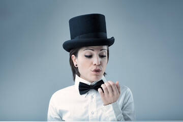 Top hat, nonchalantly dismissive