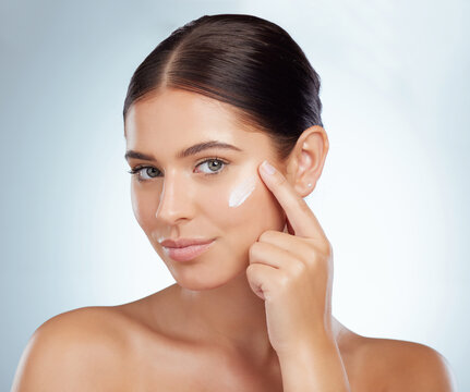 Face, Skincare And Beauty Of Woman With Cream In Studio Isolated On A White Background. Portrait, Dermatology Lotion And Female Model Apply Cosmetics, Sunscreen Or Moisturizer Product For Skin Health